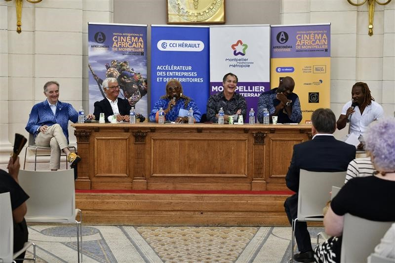 Conférence d'ouverture du Festival Africinéma Occitanie à l'Hôtel Saint-Côme, table ronde des intervenants face au public